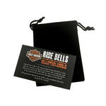 The ride bell includes an attachment for hanging, a felt pouch, and a legend card.